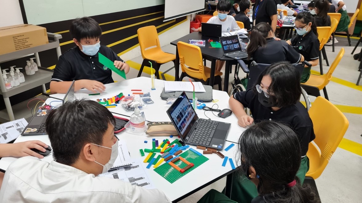 To help students see the relevance of coding in solving real-world problems, Mr Stanley Tan from Jurongville Secondary School guides them through the process of using LEGO kids to develop sensors for natural disasters like landslides. 